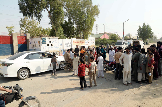 residents of surjani town gather outside surjani town police station after arrested father of an 11 month old little girl confessed to torturing his own child to death photo ppi