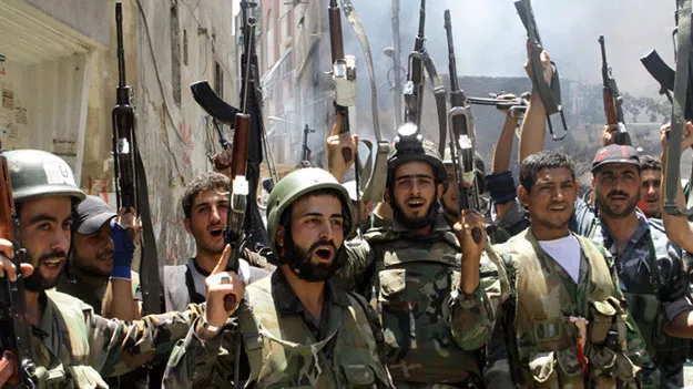 syrian soldiers celebrate in the al midan area in damascus photo afp syrian soldiers celebrate in the al midan area in damascus photo afp