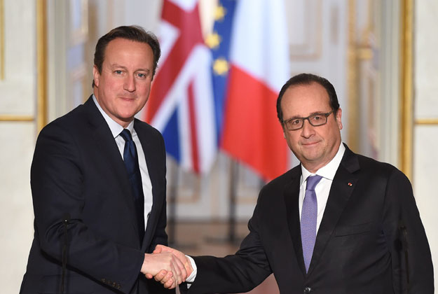 french president francois hollande r and british prime minister david cameron shake hands after a joint statement following talks on november 23 2015 at the elysee presidential palace in paris photo afp