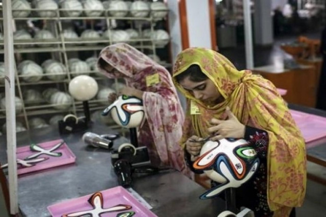 pictire shows female laborers working in an industry photo reuters pictire shows female laborers working in an industry photo reuters
