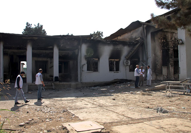 members of medecins sans frontieres msf look inside the damaged compound of a msf hospital in kunduz afghanistan on october 17 2015 photo reuters