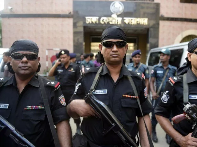 bangladeshi security personnel stand guard outside the main prison in dhaka photo afp bangladeshi security personnel stand guard outside the main prison in dhaka photo afp