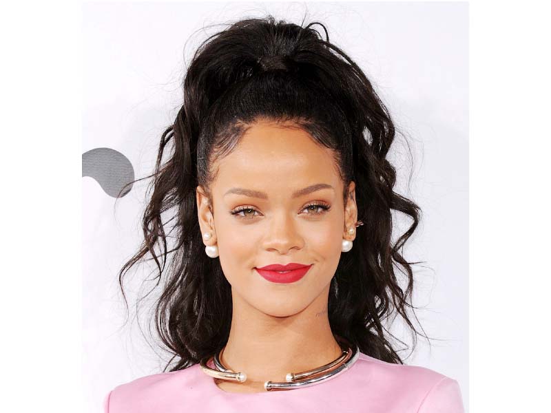 rihanna has signed deals with an electronic giant to promote her album photo file