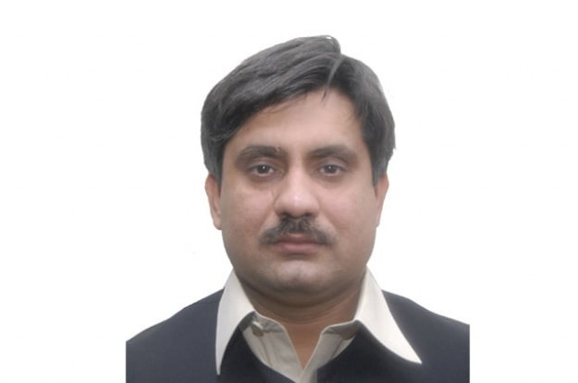 file photo of mohammad tariq director for finance at abdul wali khan university mardan file photo of mohammad tariq director for finance at abdul wali khan university mardan