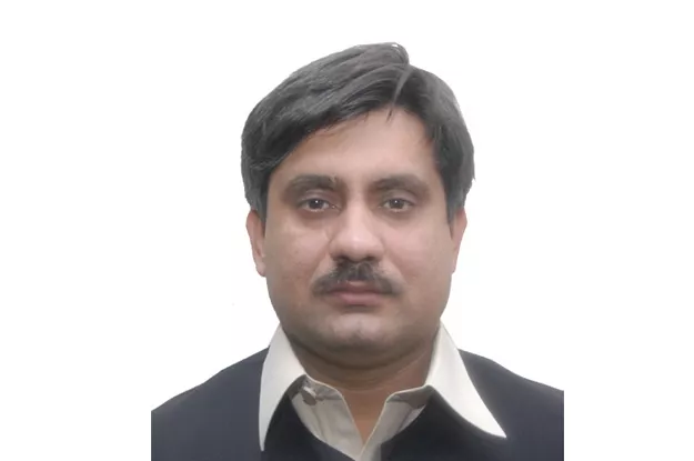 file photo of mohammad tariq director for finance at abdul wali khan university mardan file photo of mohammad tariq director for finance at abdul wali khan university mardan