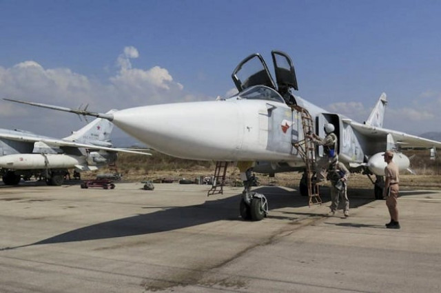pilots of a russian sukhoi su 24 fighter jet prepare before a flight at the hmeymim air base near latakia syria in this handout photograph released by russia 039 s defence ministry october 5 2015 photo reuters pilots of a russian sukhoi su 24 fighter jet prepare before a flight at the hmeymim air base near latakia syria in this handout photograph released by russia 039 s defence ministry october 5 2015 photo reuters