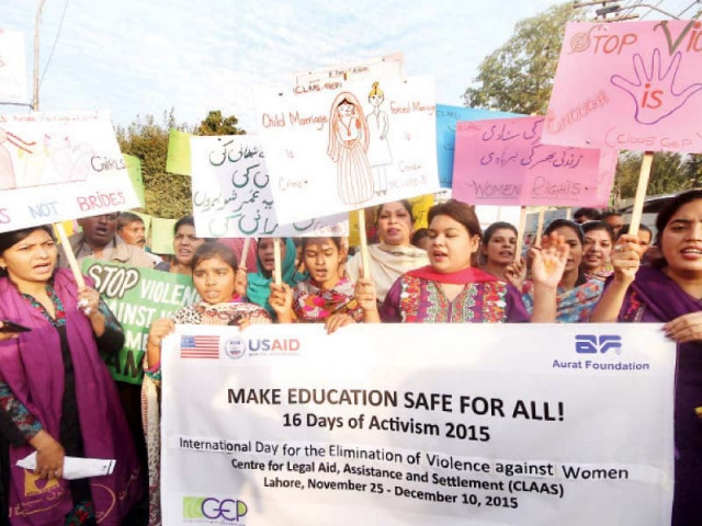civil society activists holding a demonstration to mark the international day for the elimination of violence against women in front of the lahore press club on wednesday photo abid nawaz express civil society activists holding a demonstration to mark the international day for the elimination of violence against women in front of the lahore press club on wednesday photo abid nawaz express