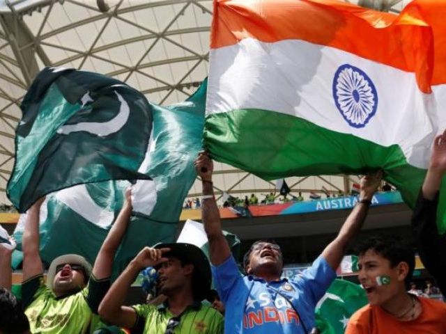 fans of pakistan 039 s cricket team l and india 039 s r cheer in the stands before pakistan 039 s cricket world cup match against india in adelaide on february 15 2015 photo reuters