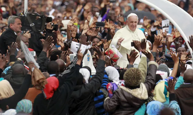 pope francis waves to faithful as he arrives for a papal mass in kenya 039 s capital nairobi november 26 2015 photo reuters pope francis waves to faithful as he arrives for a papal mass in kenya 039 s capital nairobi november 26 2015 photo reuters