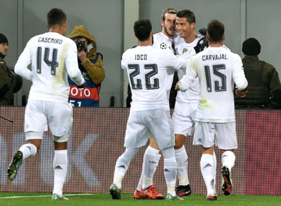 four goal real survive shakhtar rally to wrap up top spot four goal real survive shakhtar rally to wrap up top spot