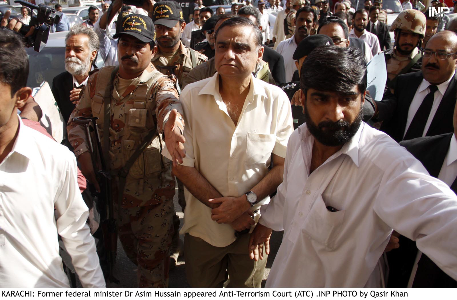 former minister dr asim hussain arrives to appear before an anti terrorism court in karachi on november 26 2015 photo online