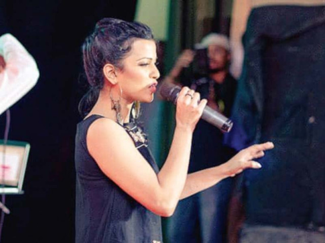 singing at a concert singing at a concert