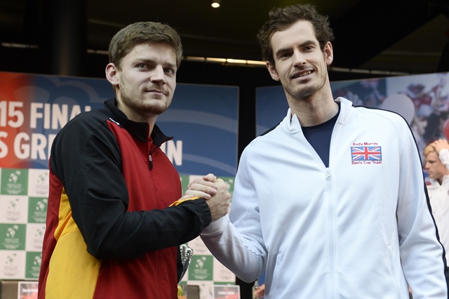 belgian david goffin l and britain 039 s andy murray r shake hands while posing on november 26 2015 at the flanders expo in gent photo afp