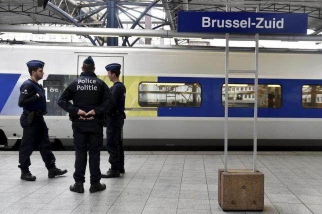 belgian police officers keep watch at gare du midi zuidstation railway station in brussels belgium photo reuters