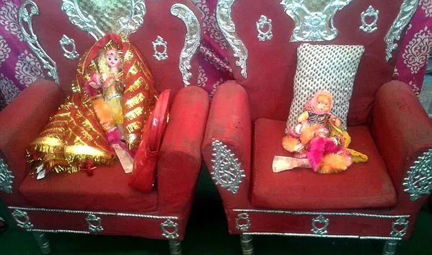grieving parents marry off dead children to dolls photo cover asia press grieving parents marry off dead children to dolls photo cover asia press