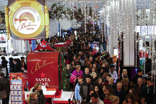 customers stream into macy 039 s flagship store in herald square on thanksgiving evening for early black friday sales on november 26 2015 in new york city photo afp