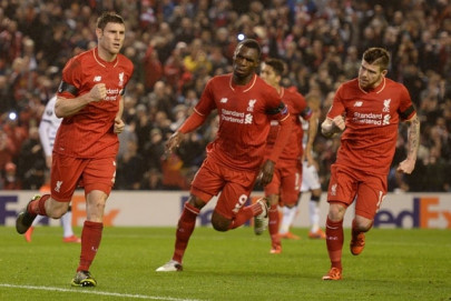 liverpool spurs into last 32 as celtic crash