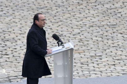 hollande vows to crush army of fanatics at solemn ceremony