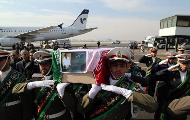 the iranian honour guard carries the coffin of iran 039 s former ambassador to lebanon ghazanfar roknabadi who was killed in saudi arabia during a repatriation ceremony upon the arrival of his body at tehran 039 s mehrabad airport on november 27 2015 photo afp the iranian honour guard carries the coffin of iran 039 s former ambassador to lebanon ghazanfar roknabadi who was killed in saudi arabia during a repatriation ceremony upon the arrival of his body at tehran 039 s mehrabad airport on november 27 2015 photo afp