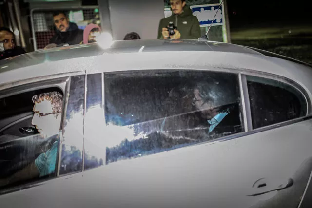 a handout picture released by turkey 039 s cumhuriyet daily shows cumhuriyet editor in chief can dundar r being escorted by anti terror police officers inside a civil car to silivri prison after appearing in court in istanbul on november 26 2015 photo afp a handout picture released by turkey 039 s cumhuriyet daily shows cumhuriyet editor in chief can dundar r being escorted by anti terror police officers inside a civil car to silivri prison after appearing in court in istanbul on november 26 2015 photo afp