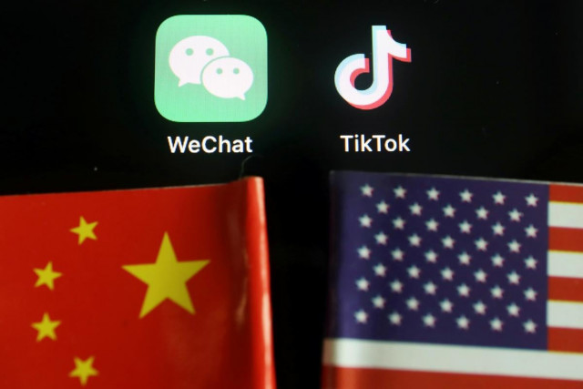the messenger app wechat and short video app tiktok are seen near china and u s flags in this illustration picture taken august 7 2020 photo reuters the messenger app wechat and short video app tiktok are seen near china and u s flags in this illustration picture taken august 7 2020 photo reuters