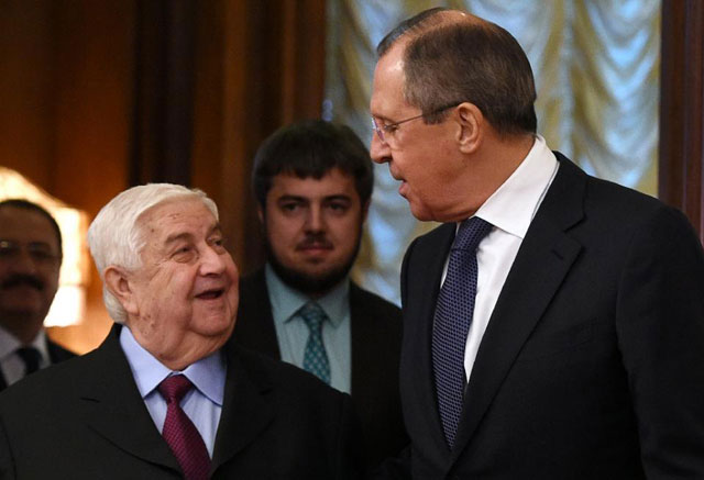 russian foreign minister sergei lavrov right speaks with his syrian counterpart walid muallem during their meeting in moscow on november 27 2015 photo afp