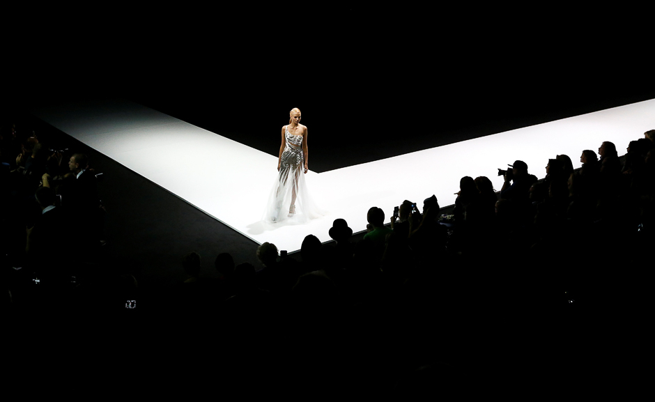 A model presents a creation by Russian designer Valentin Yudashkin as part of his Spring/Summer 2017 ready-to-wear collection during the Moscow Fashion Week in Moscow, Russia. PHOTO: REUTERS