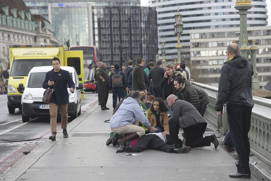 Injured people are assisted after the incident. PHOTO: REUTERS