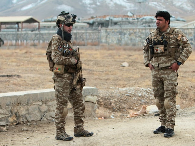 afghan national security forces keep watch outside of a military compound after a car bomb blast on the outskirts of ghazni city afghanistan november 29 photo reuters afghan national security forces keep watch outside of a military compound after a car bomb blast on the outskirts of ghazni city afghanistan november 29 photo reuters