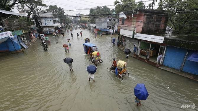 the heavy rains have swollen two main himalayan river systems   the brahmaputra and the ganges   that flow through india and bangladesh photo afp file