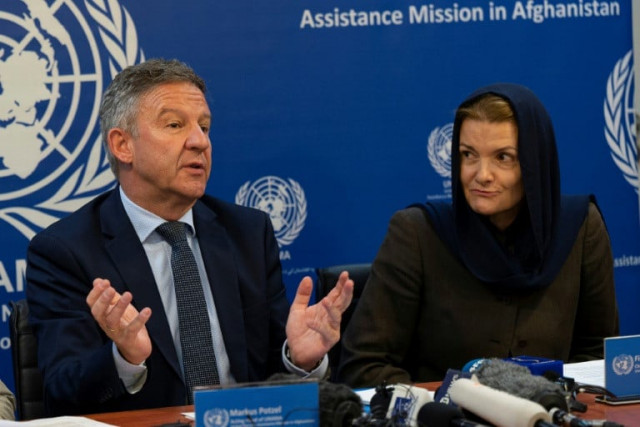 markus potzel and fiona frazer of the united nations assistance mission in afghanistan told a press conference in kabul that the taliban were responsible for hundreds of rights violations photo afp