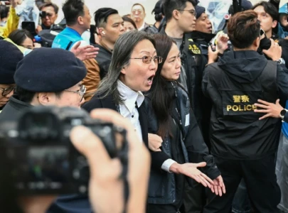 hong kong supporters defiant as 45 democracy activists sentenced