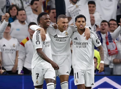 uefa champions league matchday 7 real madrid arsenal and milan edge closer to final 16