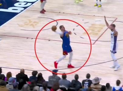 watch jokic s incredible 66 ft three pointer in win over kings