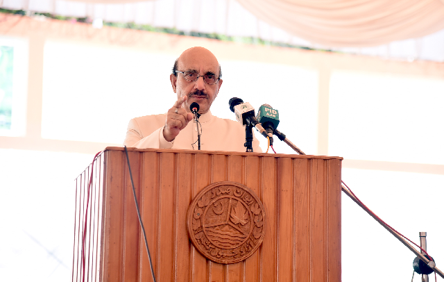 ajk president sardar masood is addressing the flag hoisting ceremony at the presidency in muzaffarabad on the occasion of independence day photo twitter masood khan