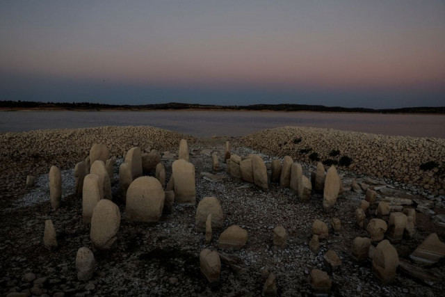 the dolmen of guadalperal also known as the spanish stonehenge is seen due to the receding waters of the valdecanas reservoir in the outskirts of el gordo spain august 3 2022 reuters the dolmen of guadalperal also known as the spanish stonehenge is seen due to the receding waters of the valdecanas reservoir in the outskirts of el gordo spain august 3 2022 reuters