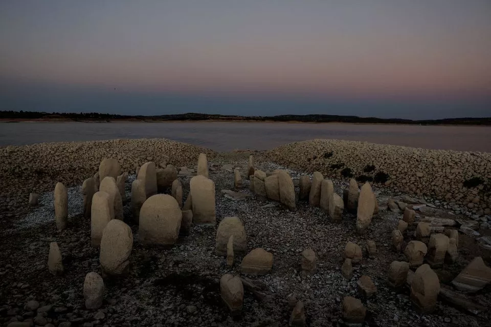 the dolmen of guadalperal also known as the spanish stonehenge is seen due to the receding waters of the valdecanas reservoir in the outskirts of el gordo spain august 3 2022 reuters the dolmen of guadalperal also known as the spanish stonehenge is seen due to the receding waters of the valdecanas reservoir in the outskirts of el gordo spain august 3 2022 reuters