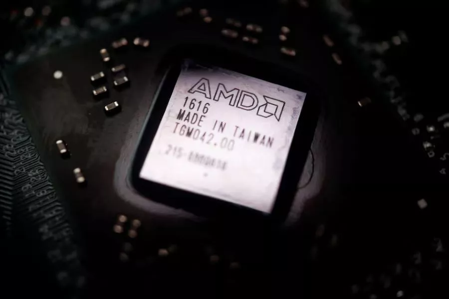 the logo of semiconductor company advanced micro devices inc amd is seen on a graphics processing unit gpu chip in this illustration picture taken february 17 2023 photo reuters the logo of semiconductor company advanced micro devices inc amd is seen on a graphics processing unit gpu chip in this illustration picture taken february 17 2023 photo reuters