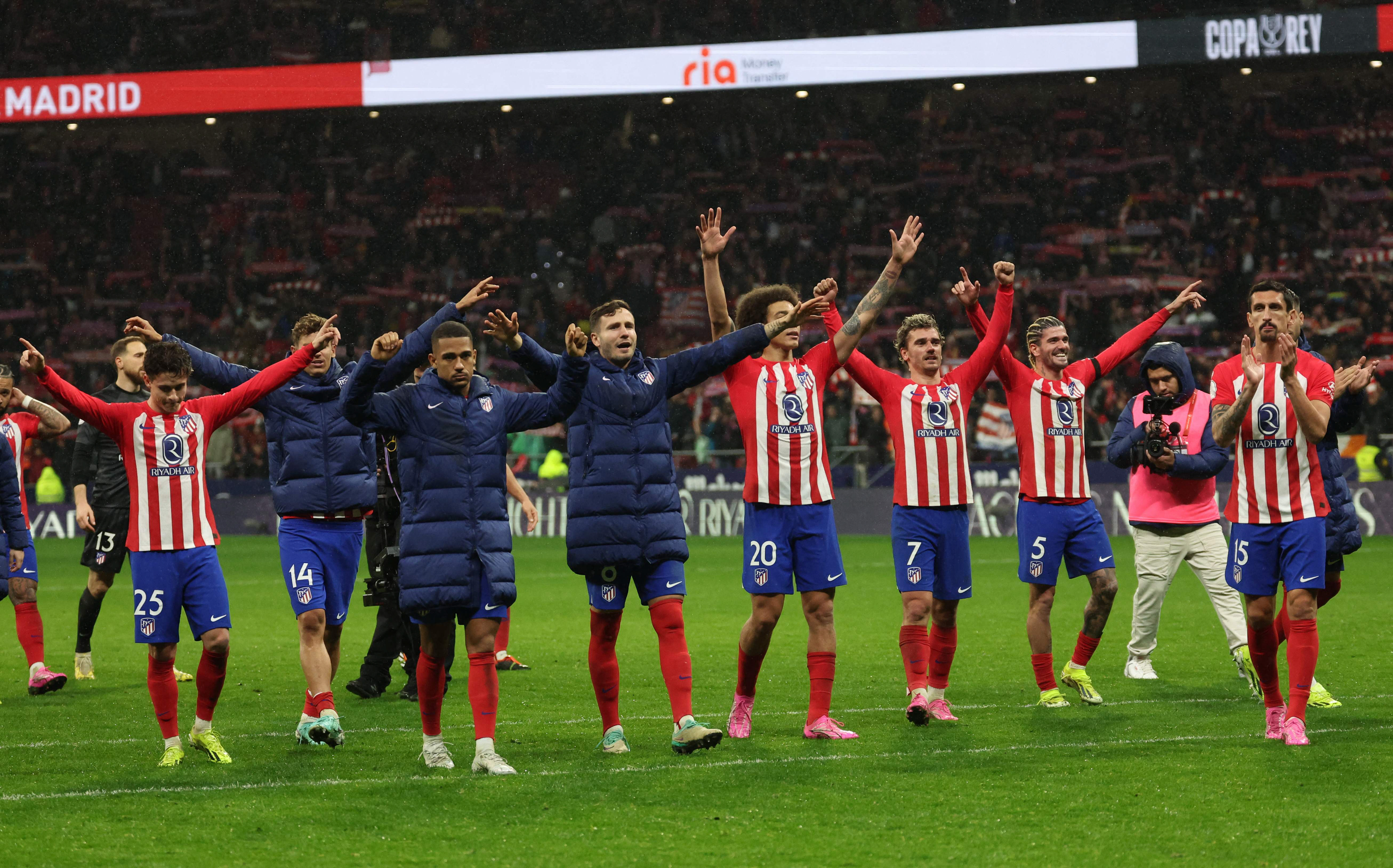 atletico madrid players celebrate their at the end of the spanish copa del rey king s cup football match against real madrid at the metropolitano stadium photo afp