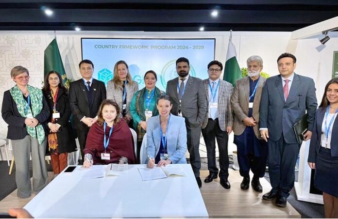 secretary climate change environmental coordination ministry aisha humera moriani and deputy director general global green growth institute ggci helena mcleod sign the four year country programme framework 2024 2028 at the pakistan pavilion on the sidelines of the un led global climate conference cop24 photo app