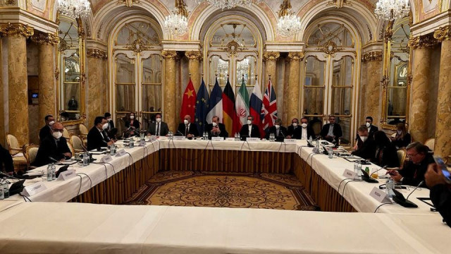 deputy secretary general of the european external action service eeas enrique mora and iran s chief nuclear negotiator ali bagheri kani with delegations wait for the start of a meeting of the jcpoa joint commission in vienna austria december 9 2021 photo reuters deputy secretary general of the european external action service eeas enrique mora and iran s chief nuclear negotiator ali bagheri kani with delegations wait for the start of a meeting of the jcpoa joint commission in vienna austria december 9 2021 photo reuters