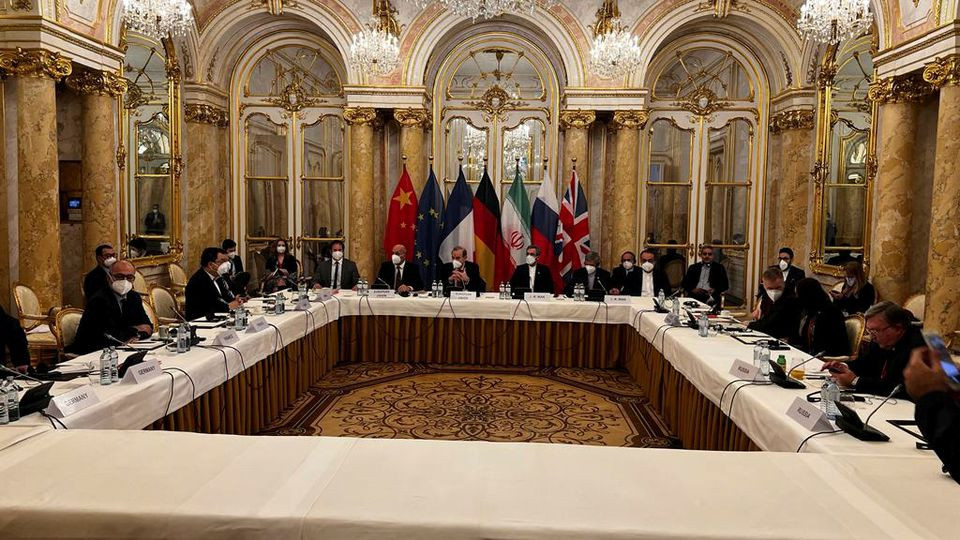 deputy secretary general of the european external action service eeas enrique mora and iran s chief nuclear negotiator ali bagheri kani with delegations wait for the start of a meeting of the jcpoa joint commission in vienna austria december 9 2021 photo reuters