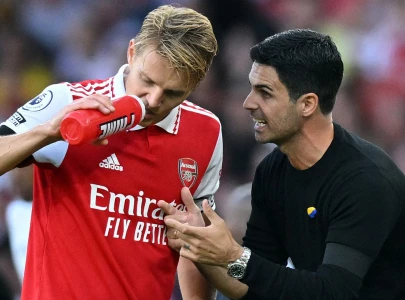 odegaard fuels arsenal s title bid