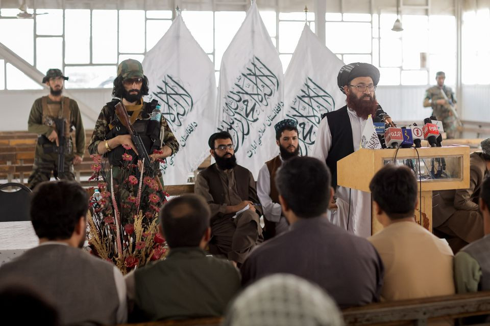 afghanistan taliban officials attend a news conference where they announced they will start issuing passports to its citizens again following months of delays that hampered attempts by those trying to flee the country after the taliban seized control in kabul afghanistan october 5 2021 reuters