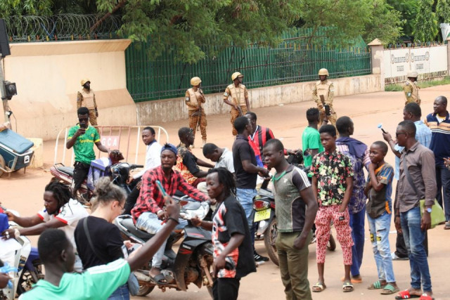 soldiers block the road to stop the advance of protesters against junta leader paul henri damiba on a street in ouagadougou burkina faso september 30 2022 reuters vincent bado soldiers block the road to stop the advance of protesters against junta leader paul henri damiba on a street in ouagadougou burkina faso september 30 2022 reuters vincent bado