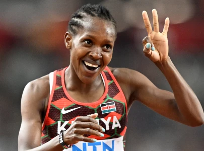 keep the faith kipyegon makes history at worlds