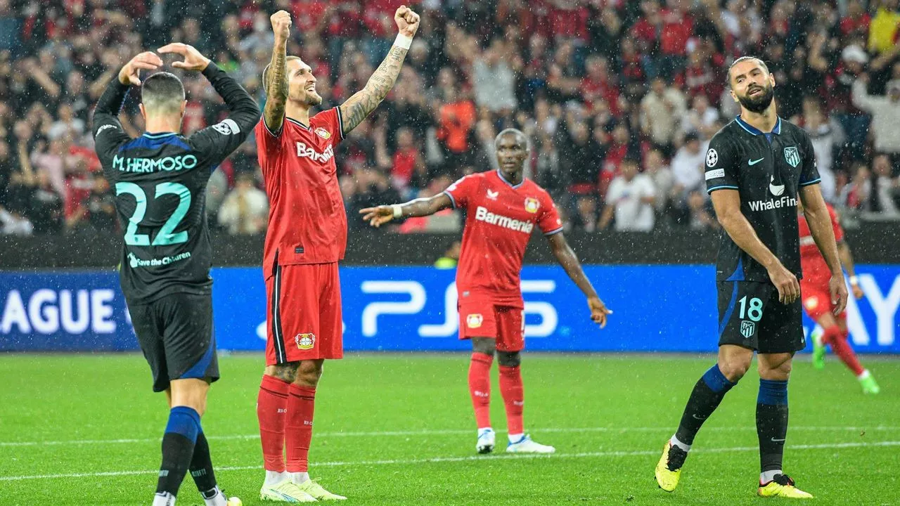 leverkusen s late goals sink atletico leverkusen s late goals sink atletico
