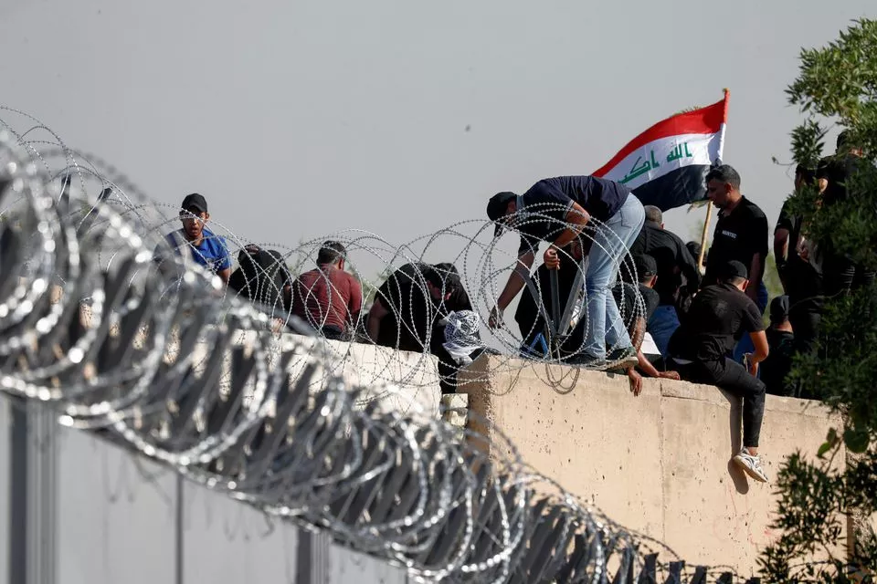supporters of iraqi populist leader moqtada al sadr protest at the green zone in baghdad iraq august 29 2022 reuters supporters of iraqi populist leader moqtada al sadr protest at the green zone in baghdad iraq august 29 2022 reuters