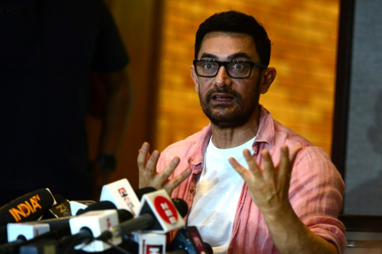 years old criticisms of narendra modi s india are returning to haunt megastar aamir khan ahead of the release of his bollywood remake of forrest gump with hindu hardliners swamping social media with boycott calls photo afp