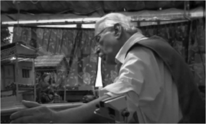 abdul karim solangi at work in his single room city museum in the musa lane area of lyari in karachi he is considered a pioneer of kinetic sculptures in the country photo express